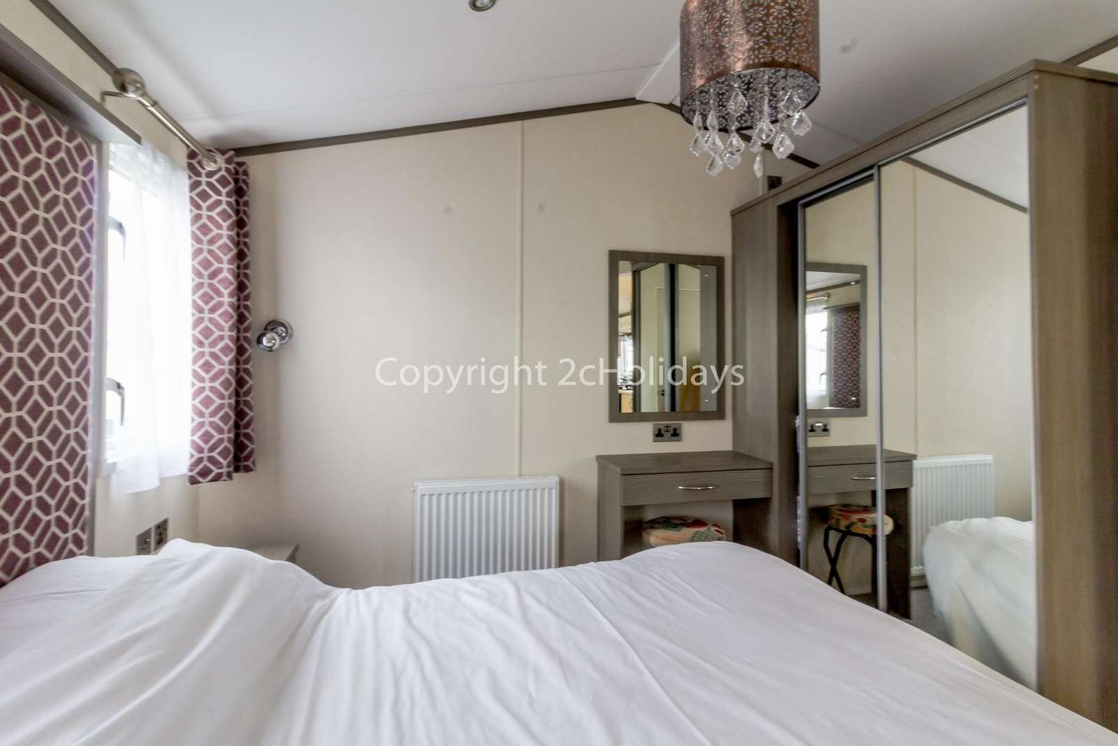 You can find plenty fo storage in this master bedroom!