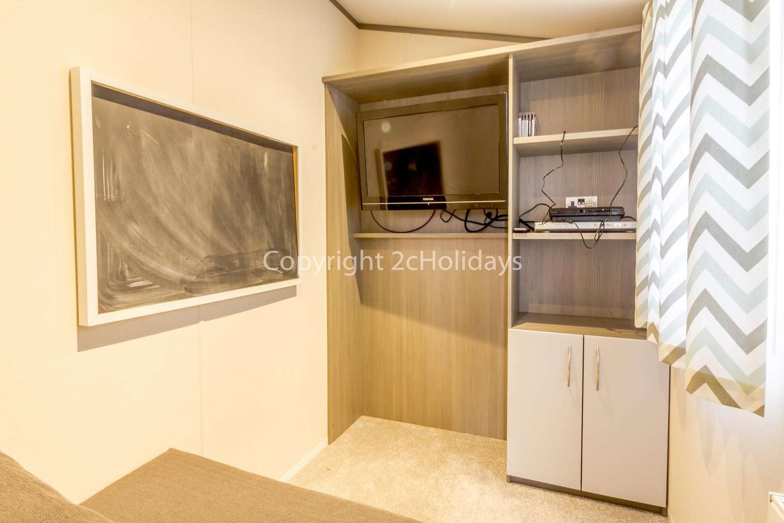 Don't forget to bring your Playstation 3 games for this unique games room with a single sofa bed!