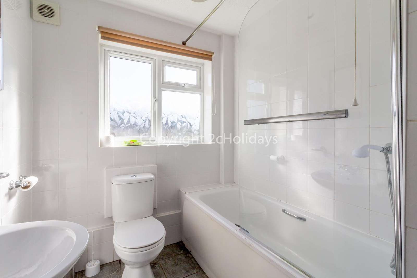 Spacious family shower room with a full size bath!
