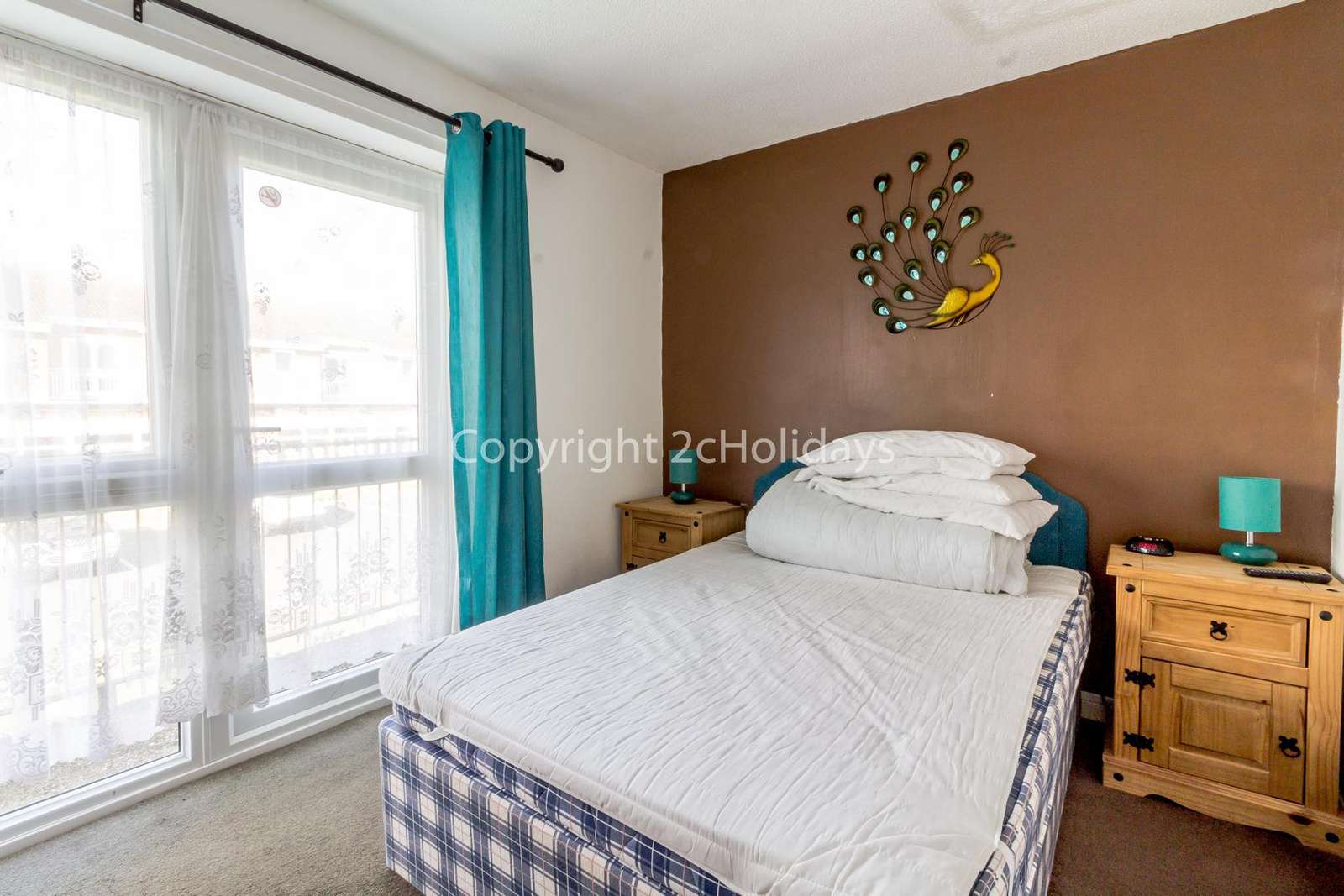 A great size master bedroom with a TV!