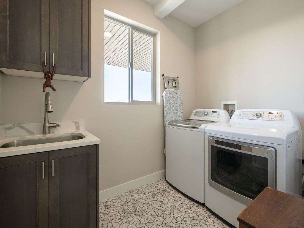 Laundry room off of kitchen on main floor