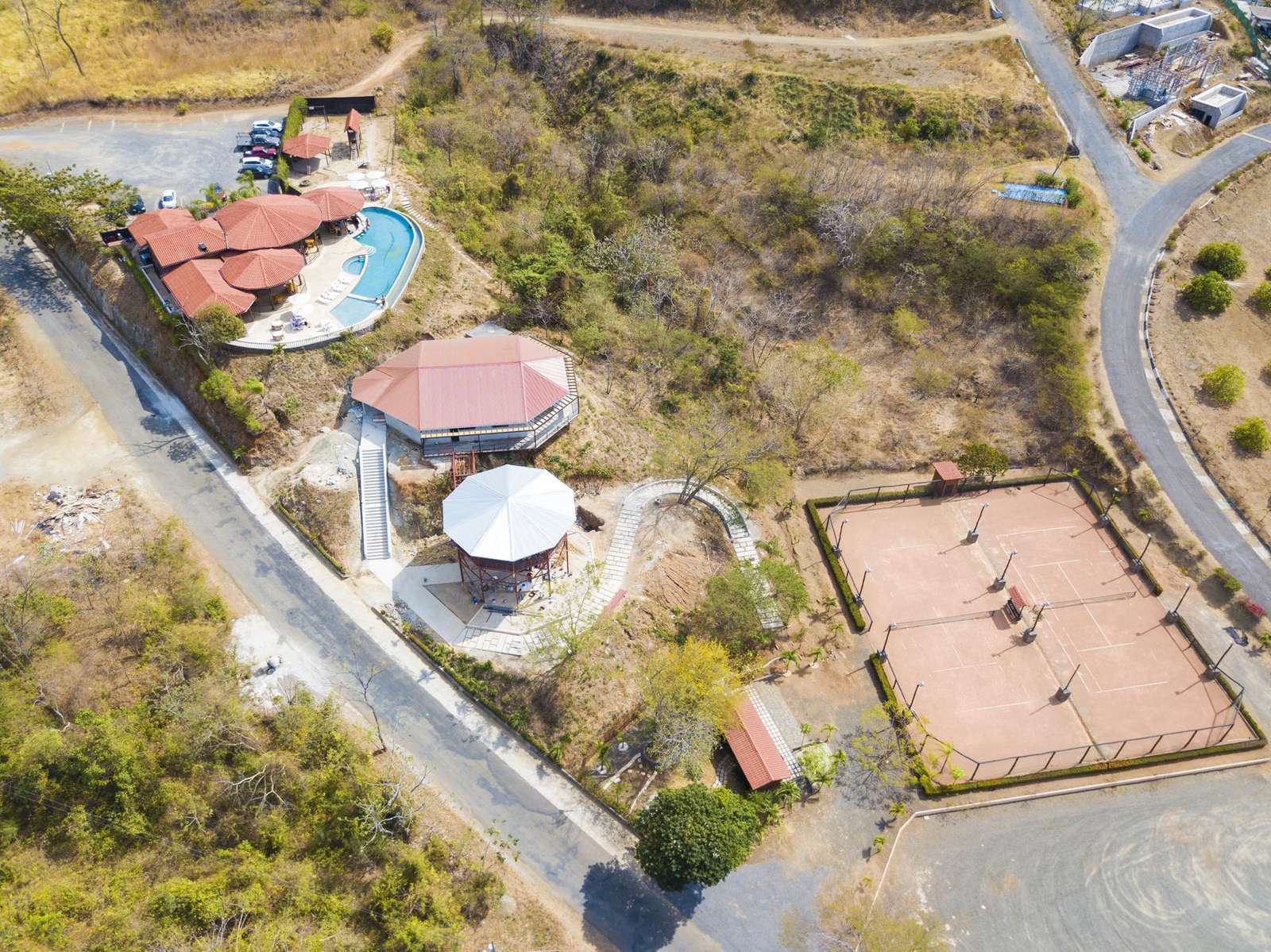 Aerial view of Mar Vista tennis Courts, community pool, onsite restaurant (Gracia) and gym and yoga studio