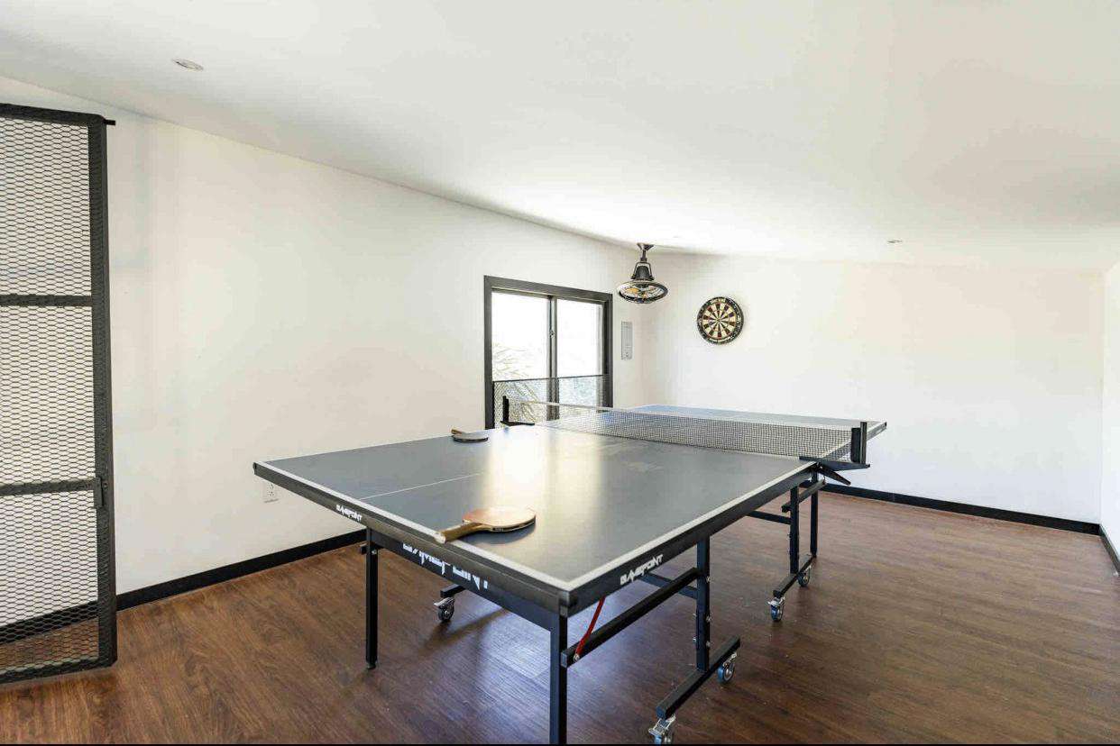 Game room with ping pong table