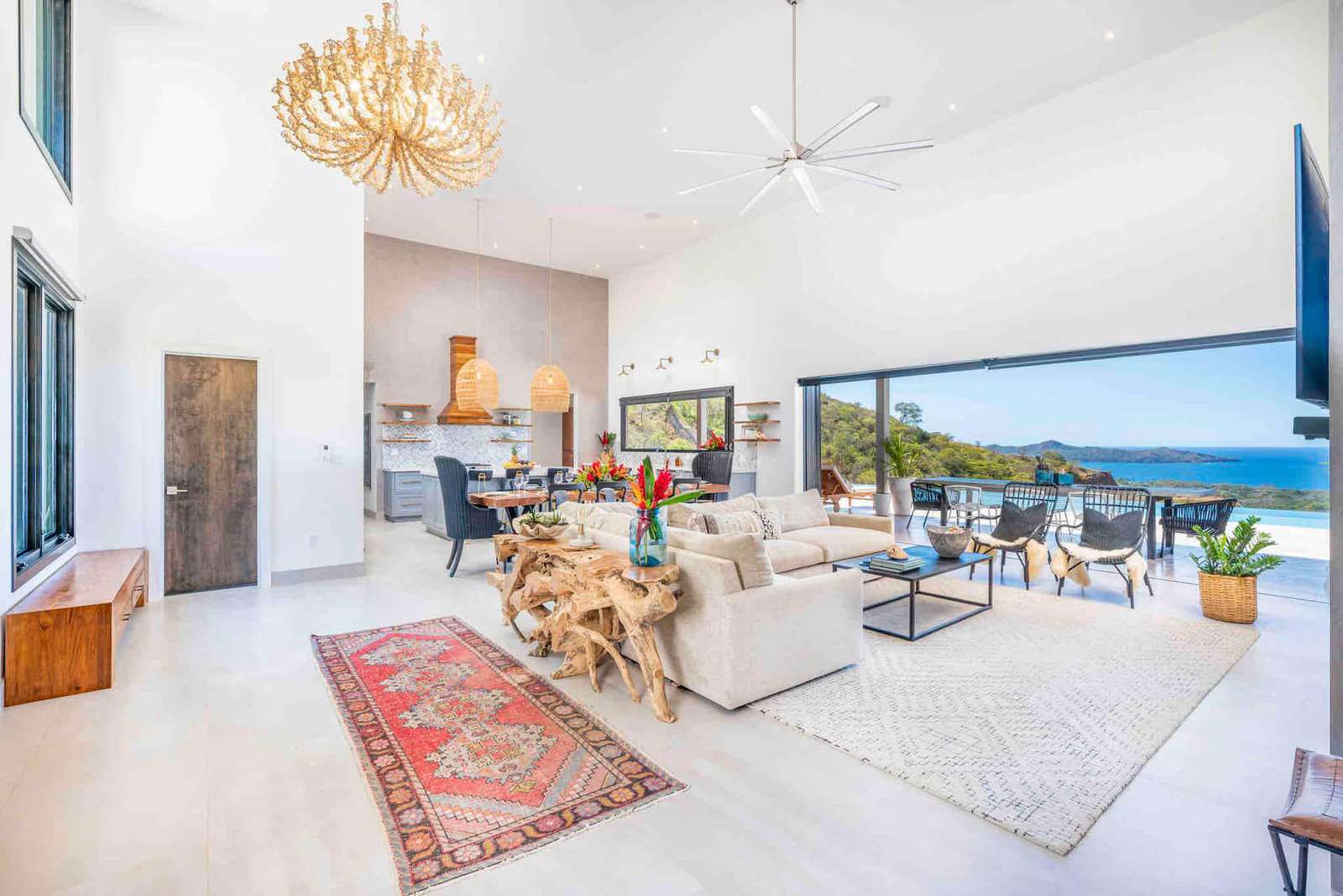 Main living area, access to the pool and covered terrace area