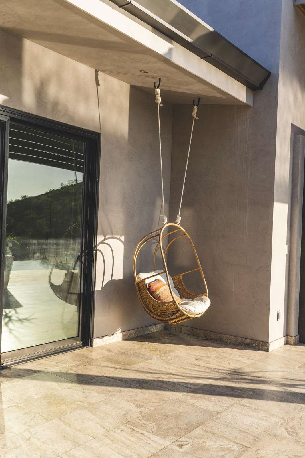 Chair hammock on the covered terrace area