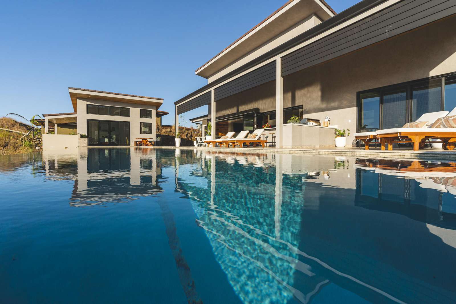 View of the lap pool, covered terrace area