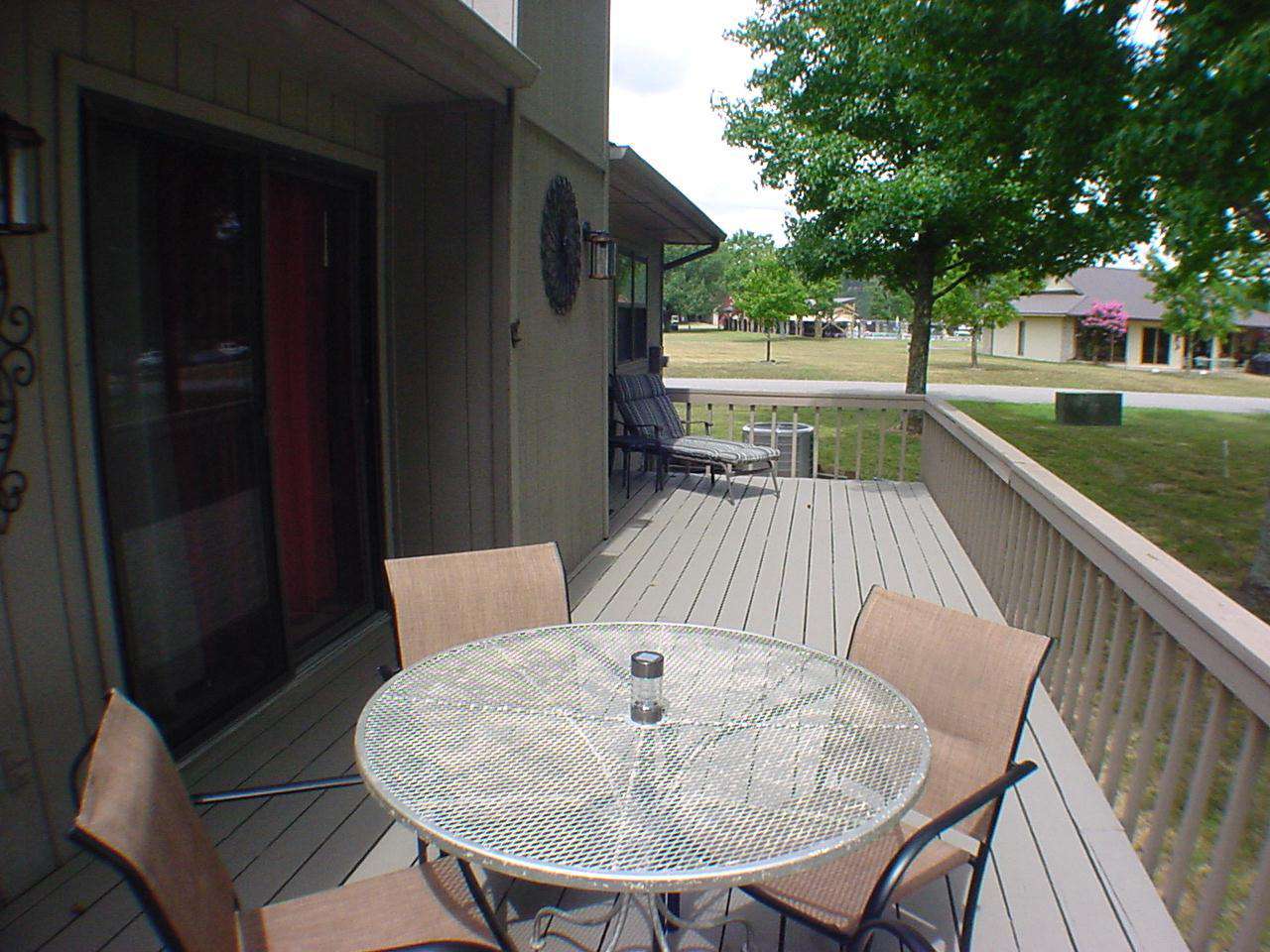 Large deck with a golf course view