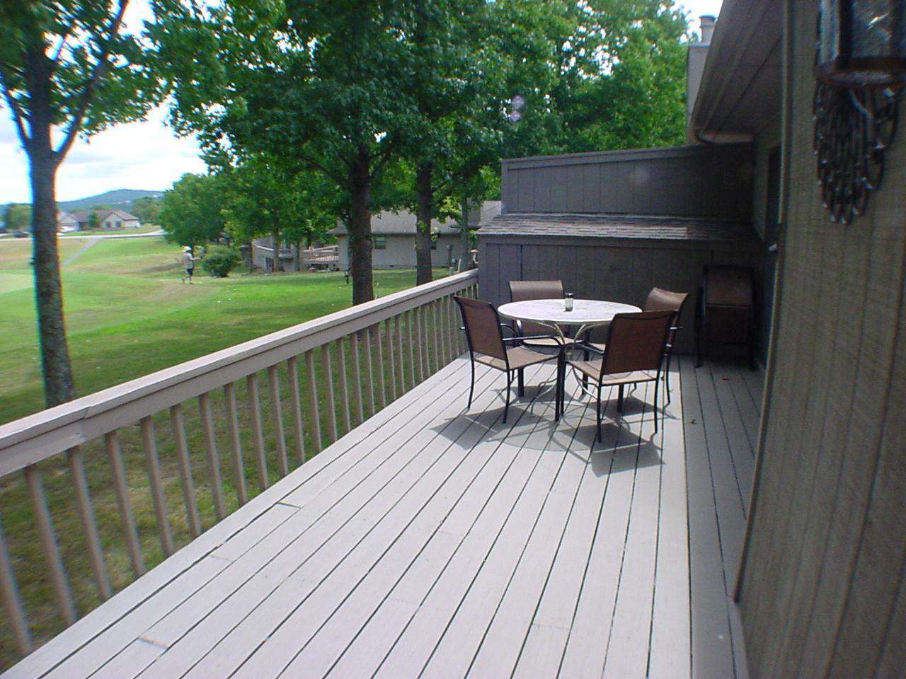 Large deck with a golf course view