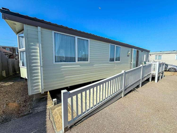 13016L⛱️ – Lee’s, 2 bed, 5 berth caravan with ramped decking and wheelchair accessible. Ruby rated. Preview 0