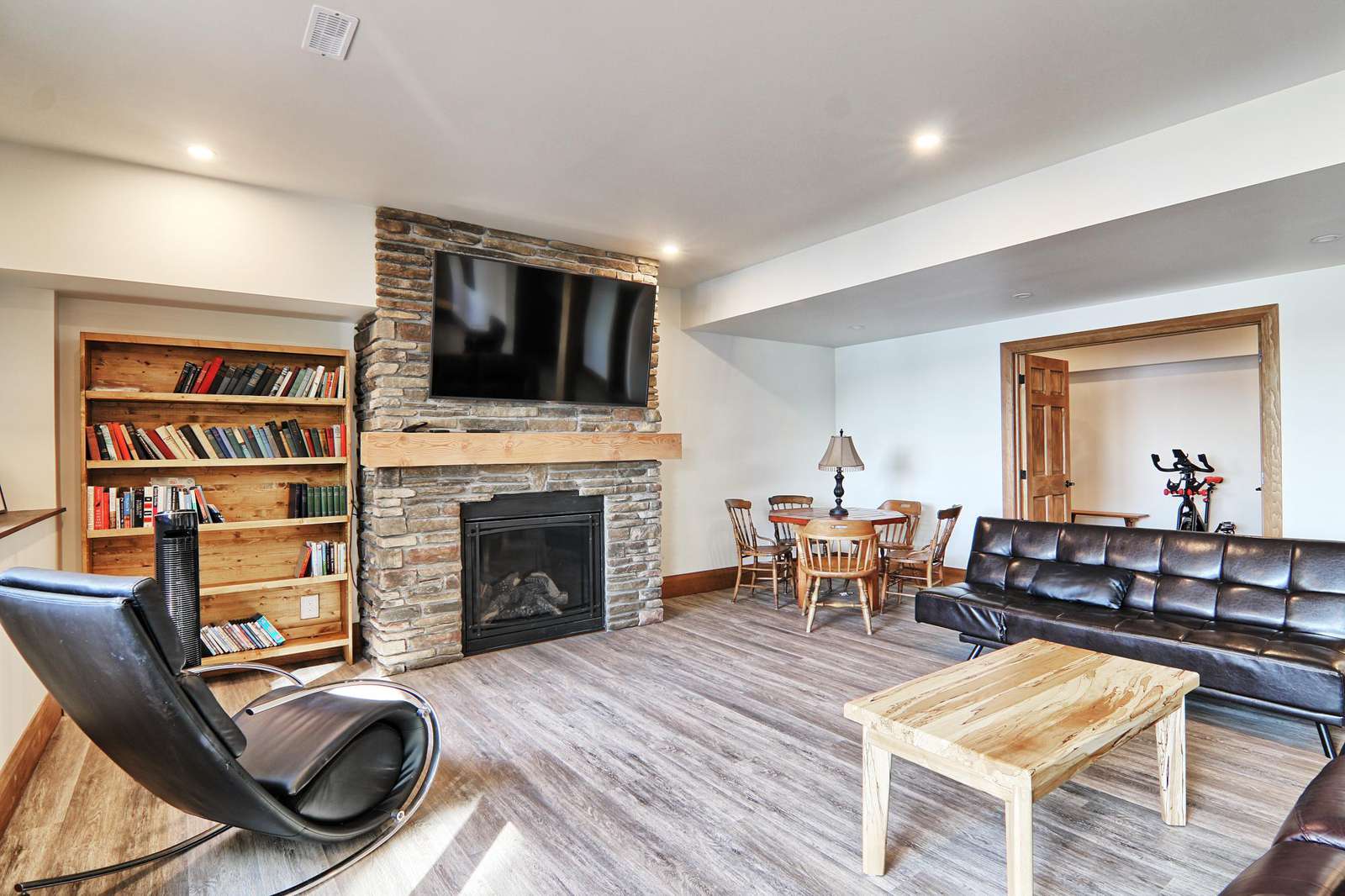 Lower Level Entertainment Room with fireplace