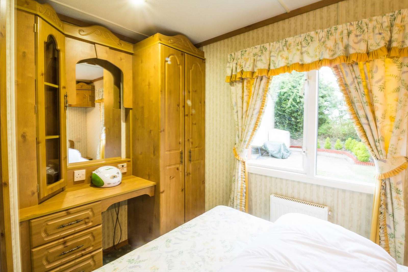 Great dressing table and wardrobe space in this caravan for hire.