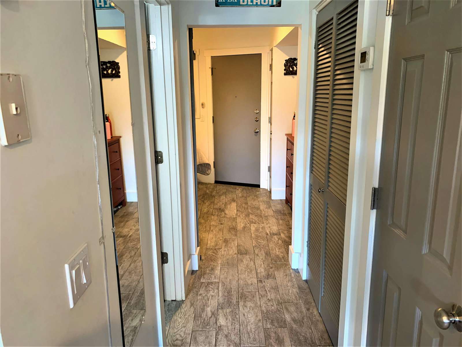 Ceramic Tile with Wood Floor Look Throughout