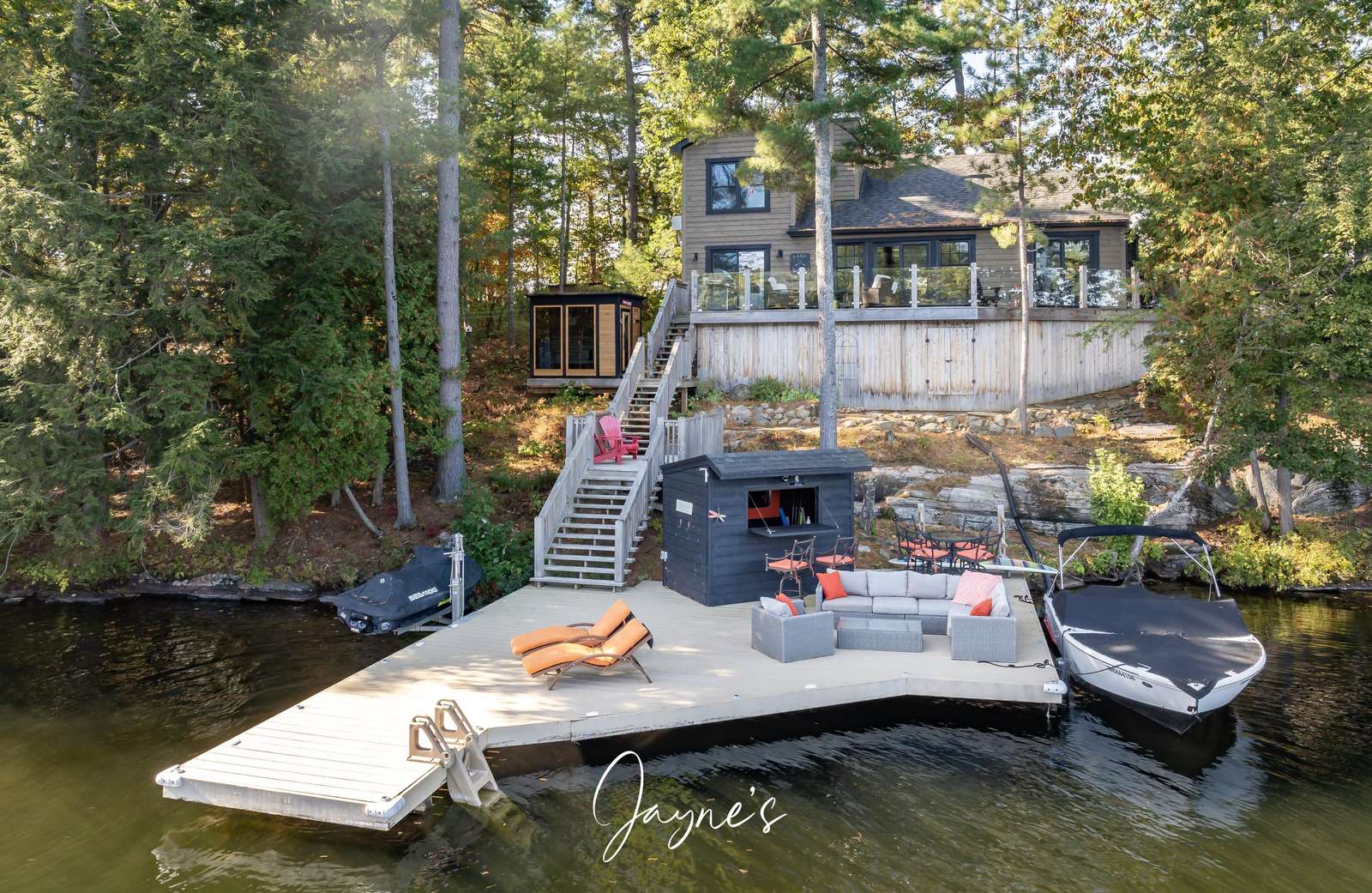 Private dock with lounge chairs and boat access for waterfront fun