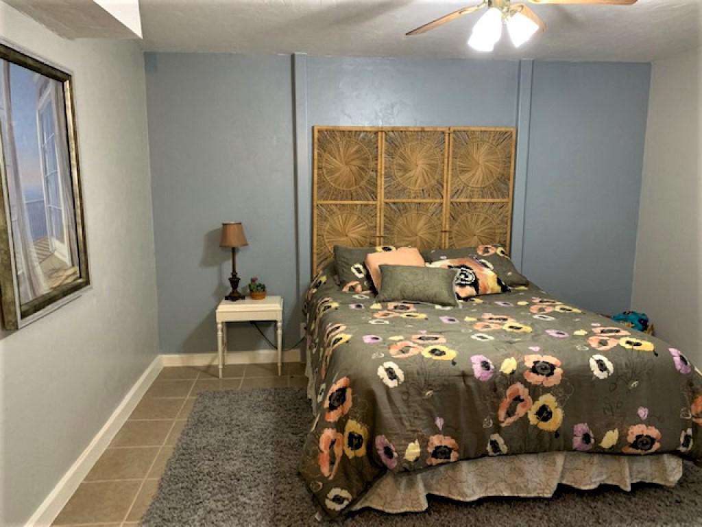 Fourth bedroom with queen bed