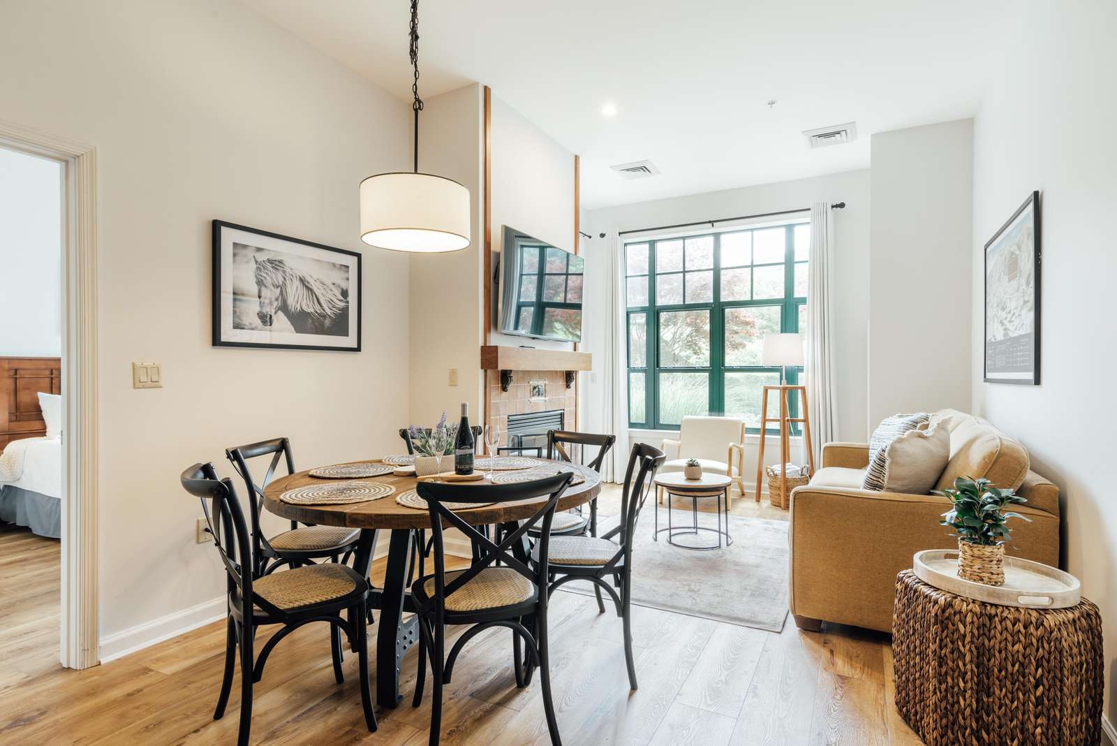 Beautiful dining area with seating for 6. The LR area with gas fireplace and mtn side views - property