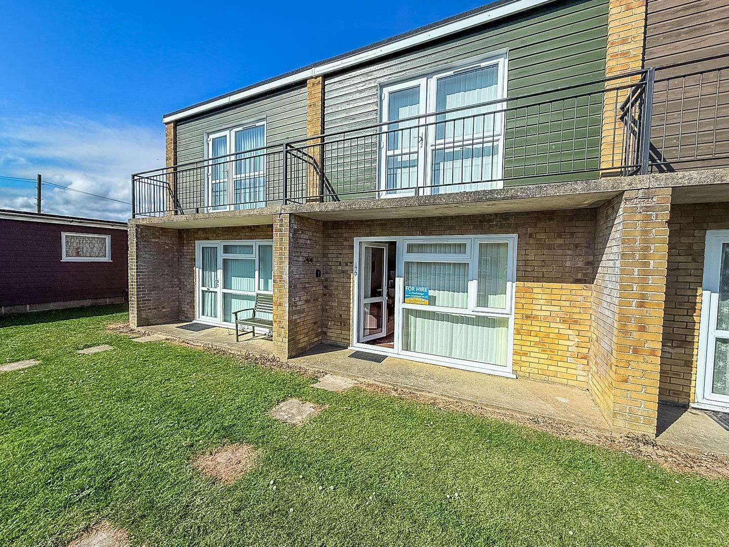 Whether for a family getaway or a romantic short stay, the chalets in Hemsby offer a welcoming exterior and easy access to the Norfolk coastline. - property