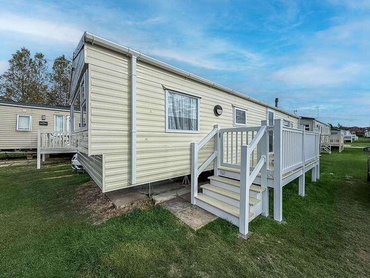 23062T⛱️ – Tudor area, 2 bed, 6 berth caravan with side decking. Opal rated. Preview 0