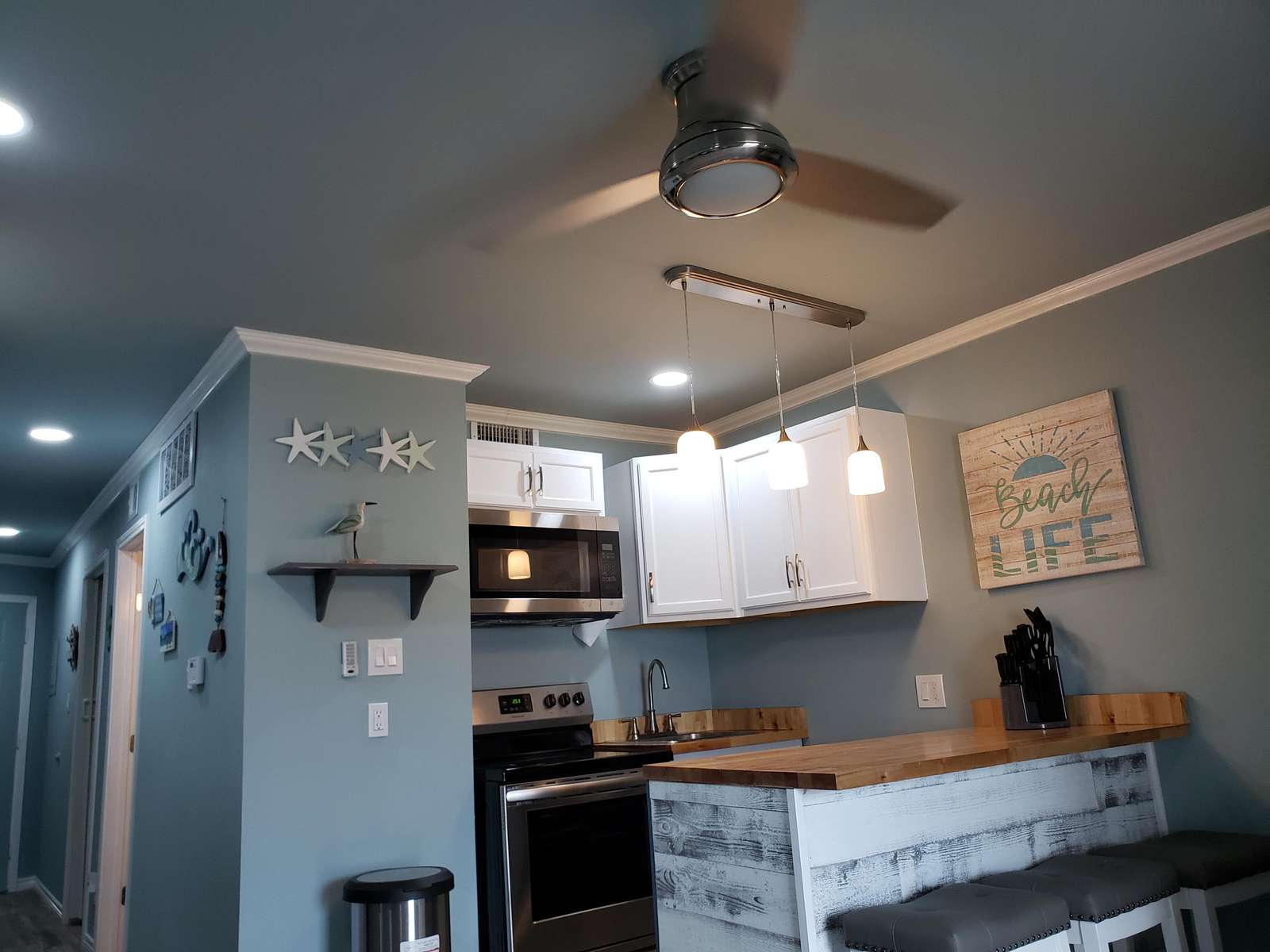 ceiling fans in the living area and bedroom
