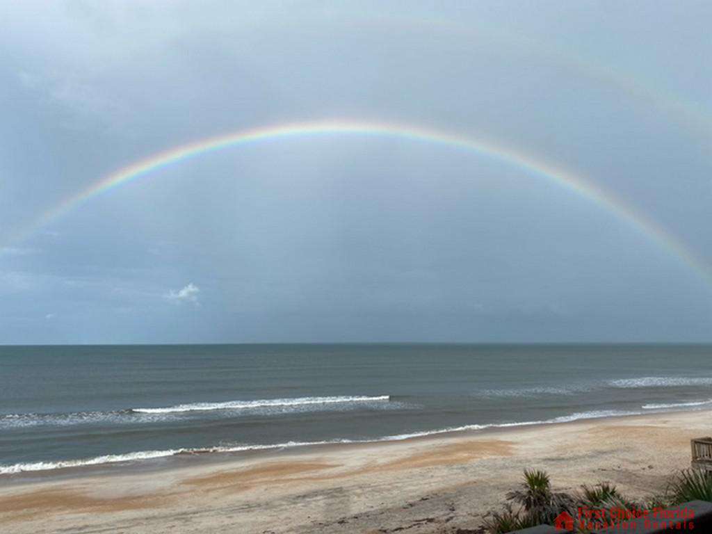 Sea Renity Rainbow over Beach