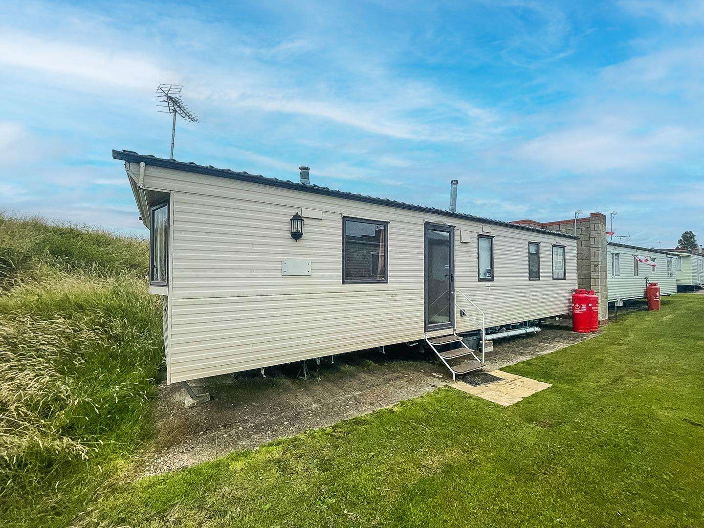 Spend your bank holiday in style with a stay in a cosy 2-bedroom, 6-berth caravan at Naze Marine, part of Parkdean Resorts. - property