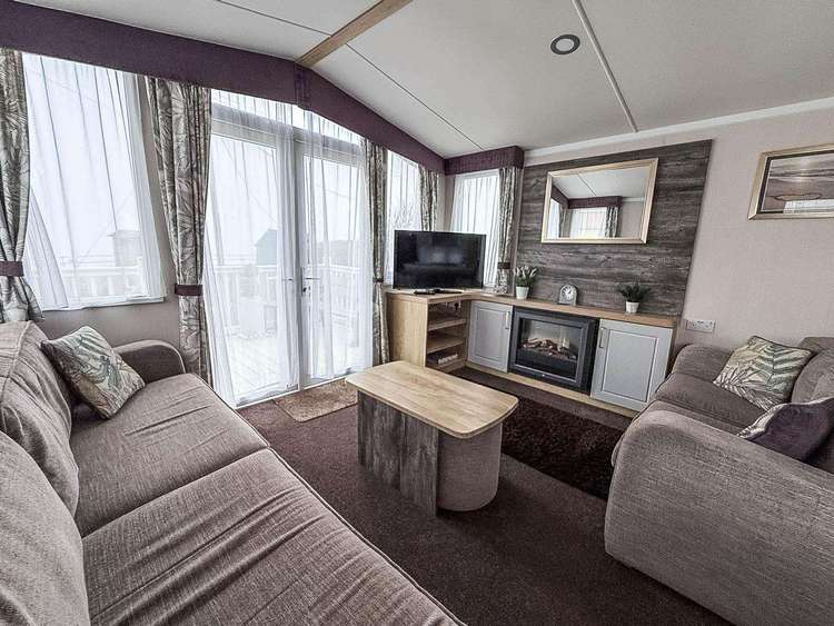 50009OC⛱️ – Osprey Court, 3 bed, 8 berth caravan with sea views and decking. Platinum rated. Preview 5
