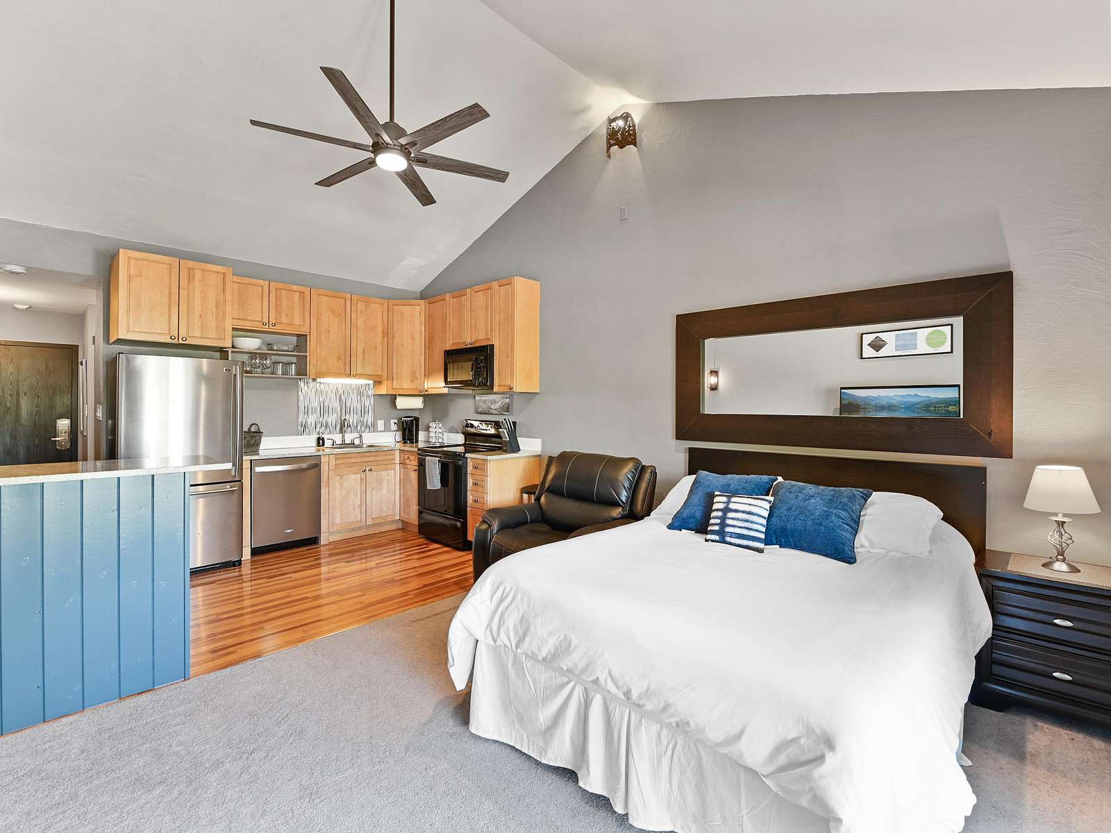 Living Space Queen Bed & Kitchen Area