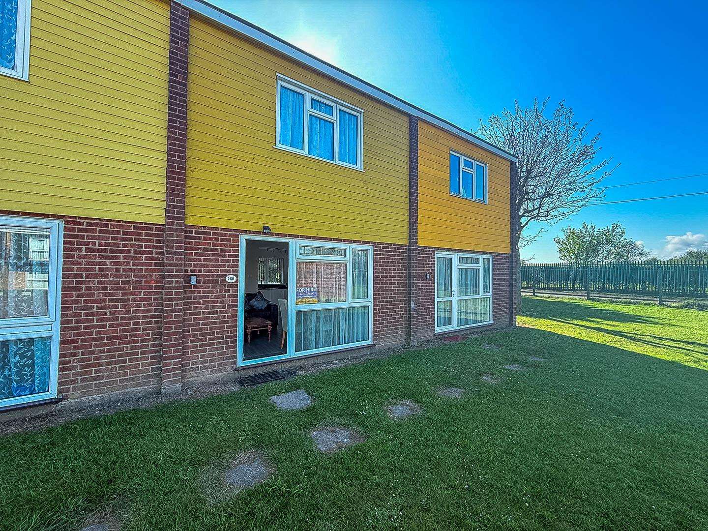 The chalets at Bermuda Holiday Park Norfolk are perfect for short stays, with their bright, cheerful exteriors and proximity to the stunning Norfolk coastline. - property