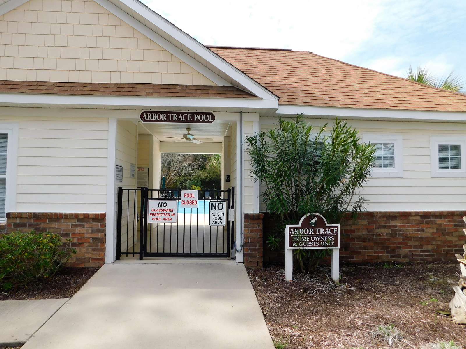 Pool entrance, has bathrooms
