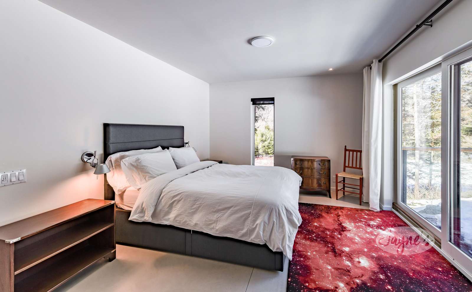 Lower Level - Bedroom 4 with private balcony