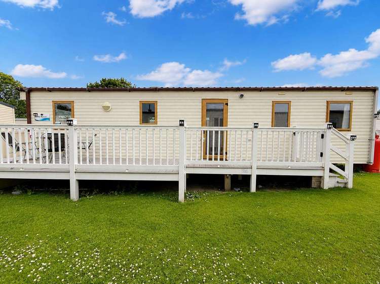 35087AF⭐ – Ash Field, 3 bed, 8 berth caravan with decking, D/G and C/H. Ruby rated. Preview 0