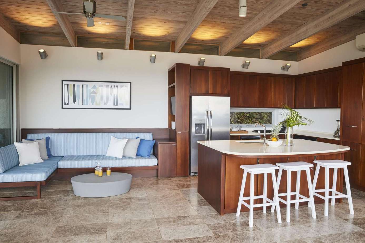 Spacious open-concept kitchen and living area with modern charm