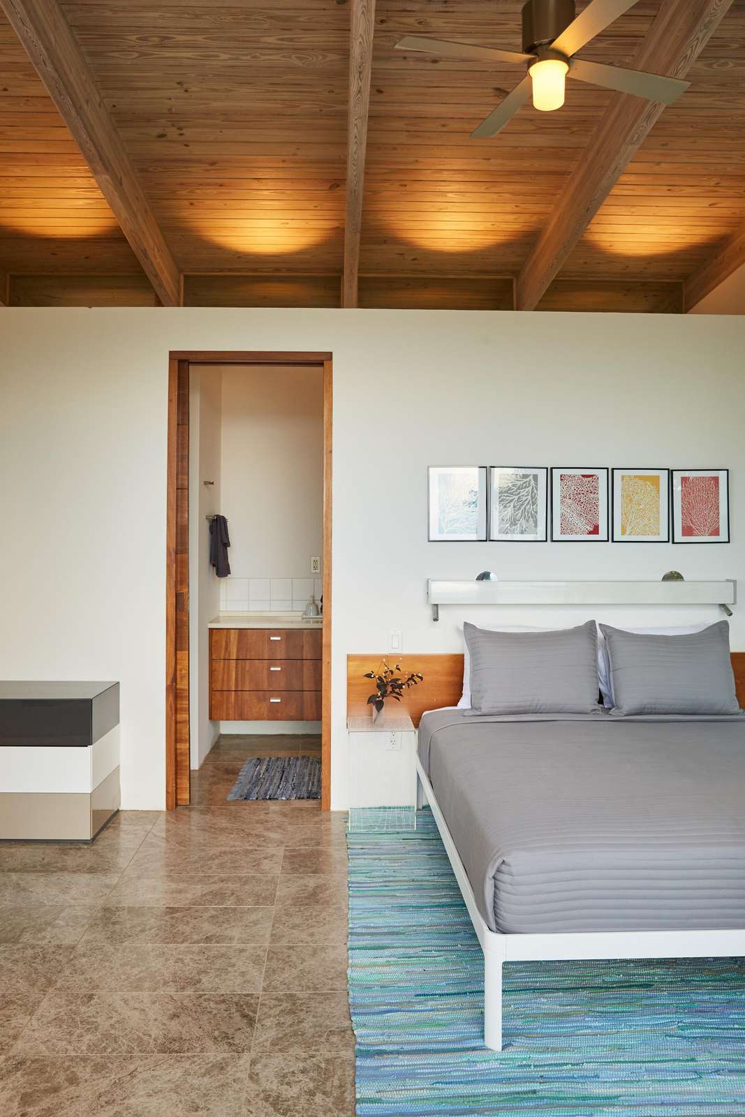 Cozy bedroom retreat with warm wood accents and natural light