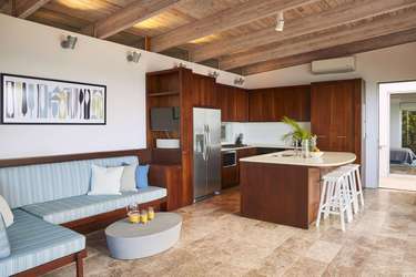 Spacious kitchen and cozy dining nook with vaulted ceilings