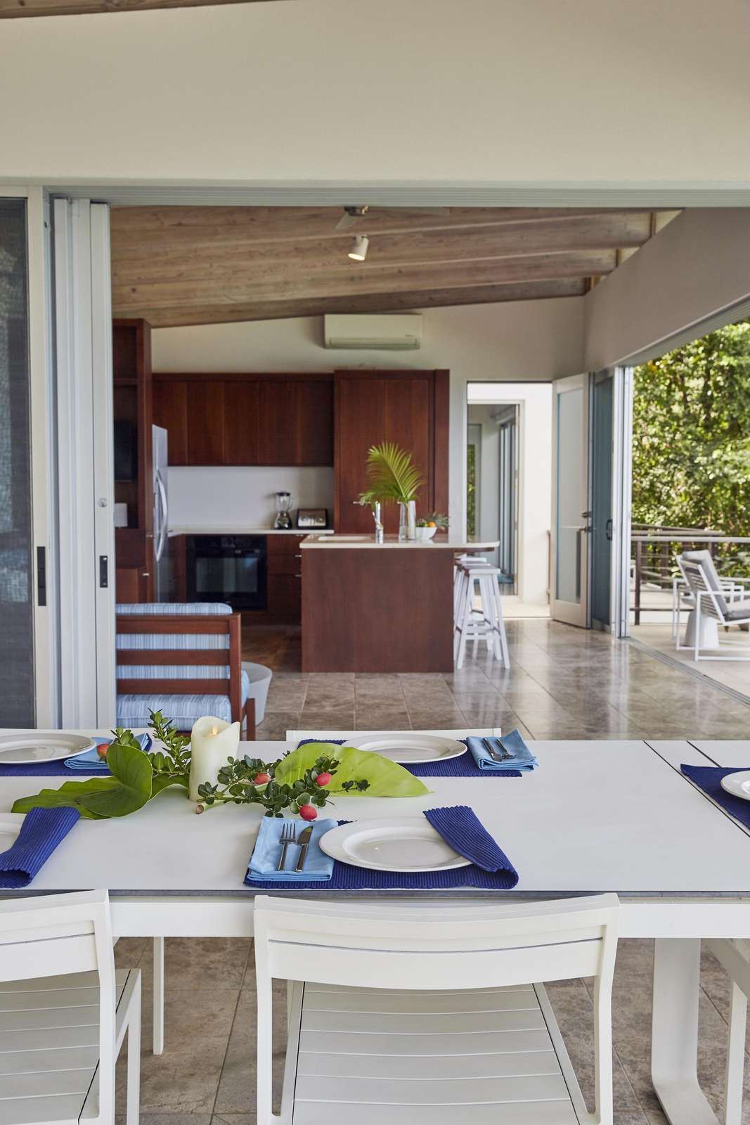 Open-air dining area blending indoor comfort with fresh breeze