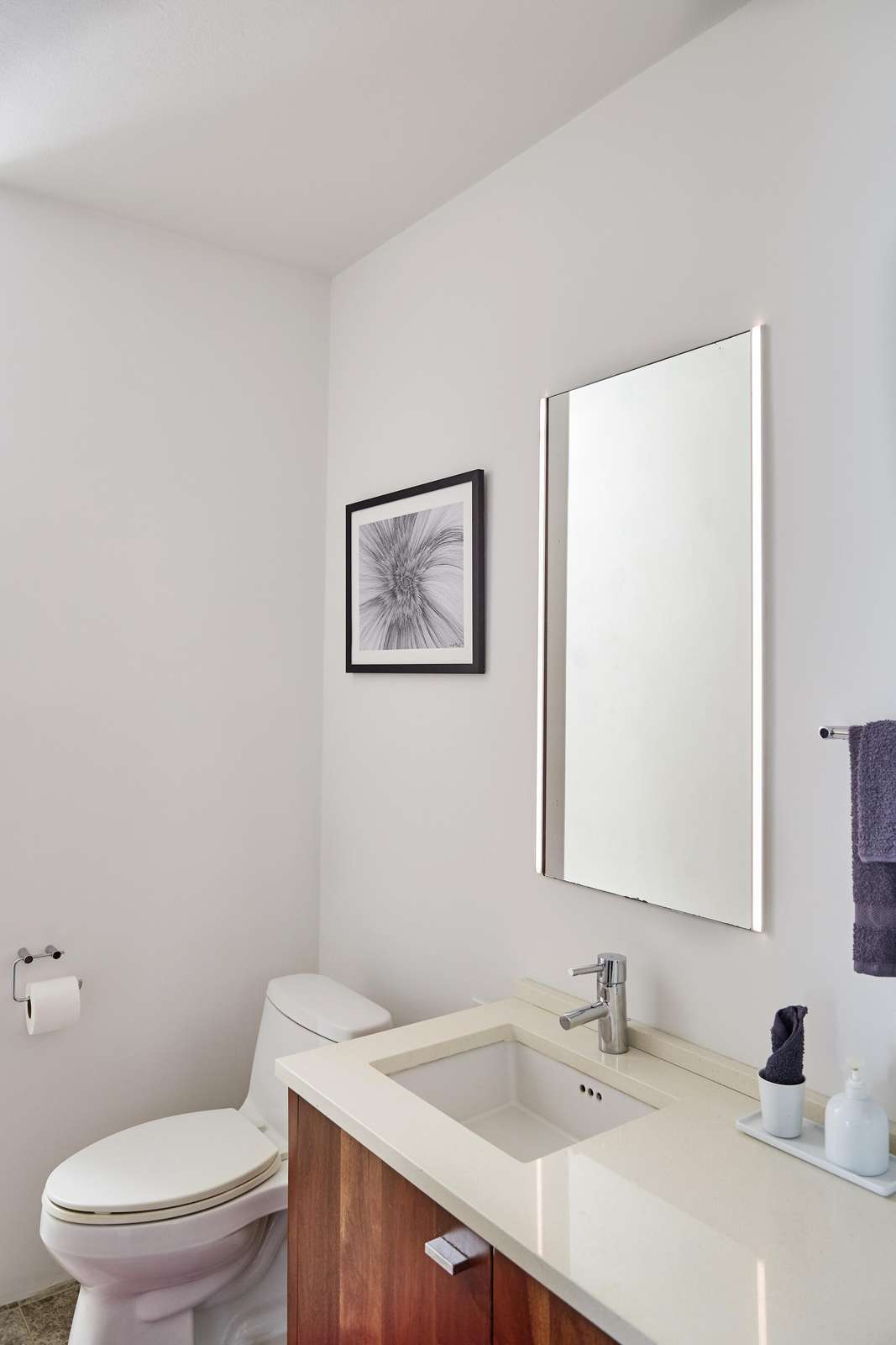 Bright, modern bathroom with sleek vanity and clean design
