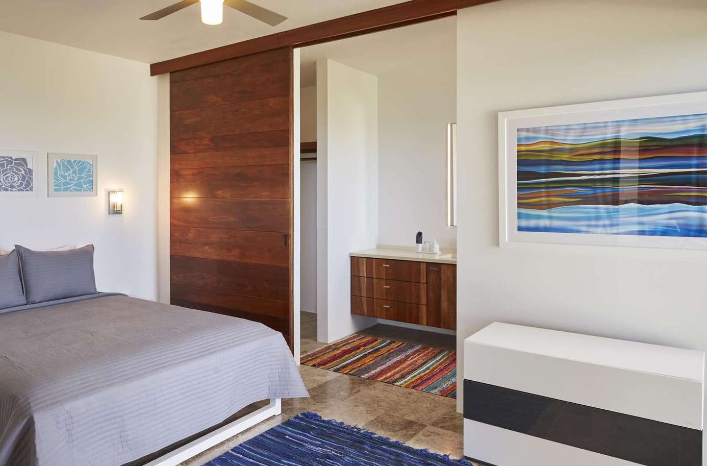 Serene bedroom retreat with modern wood accents and cozy lighting