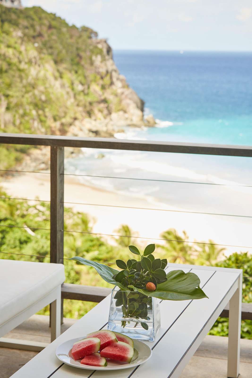Oceanfront balcony with stunning beach and cliff views