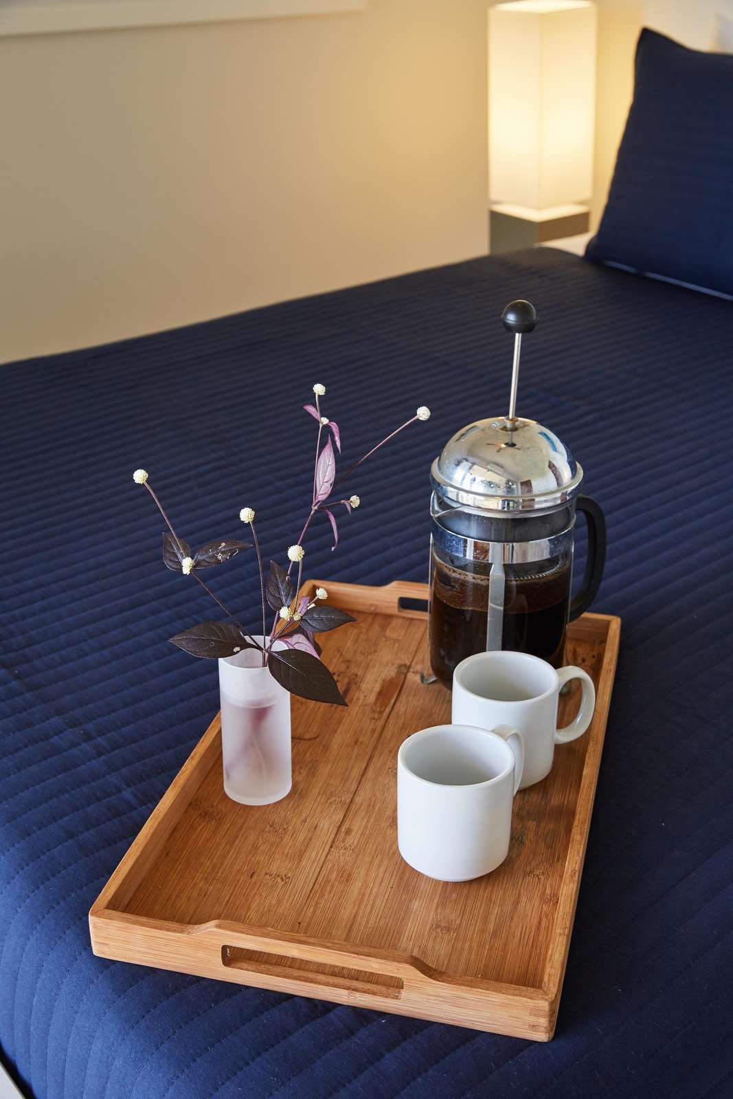 Cozy bedroom nook with morning coffee setup