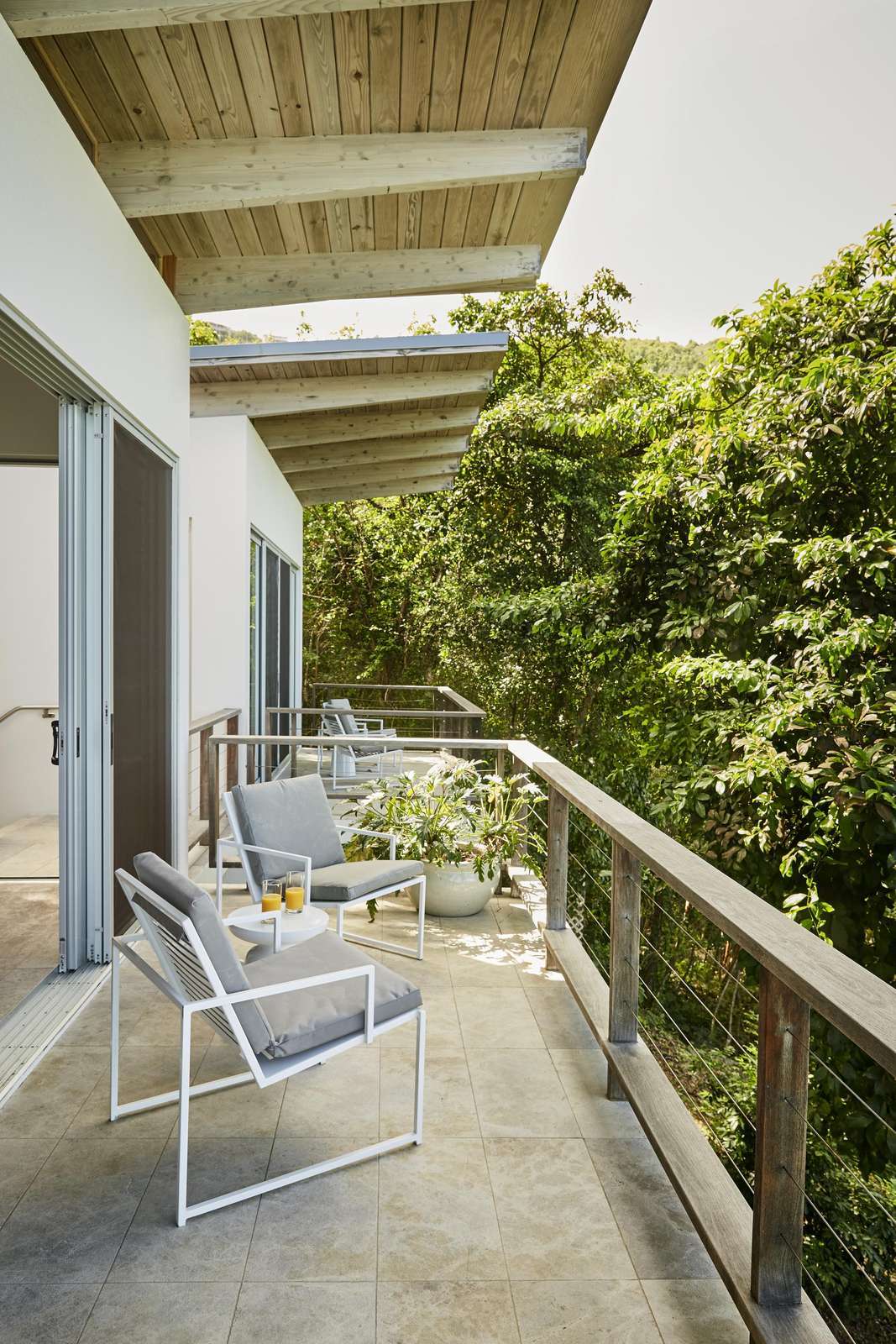 Tranquil balcony retreat with lush green views