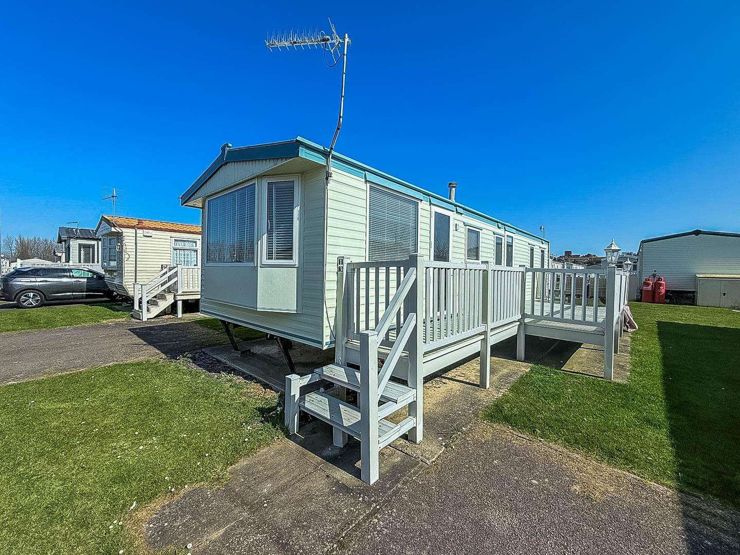 Discover the perfect base for your next UK holiday in this lovely 8 berth caravan with decking located on Manor Park Holiday Park, Hunstanton, and explore the stunning Norfolk coast. - property