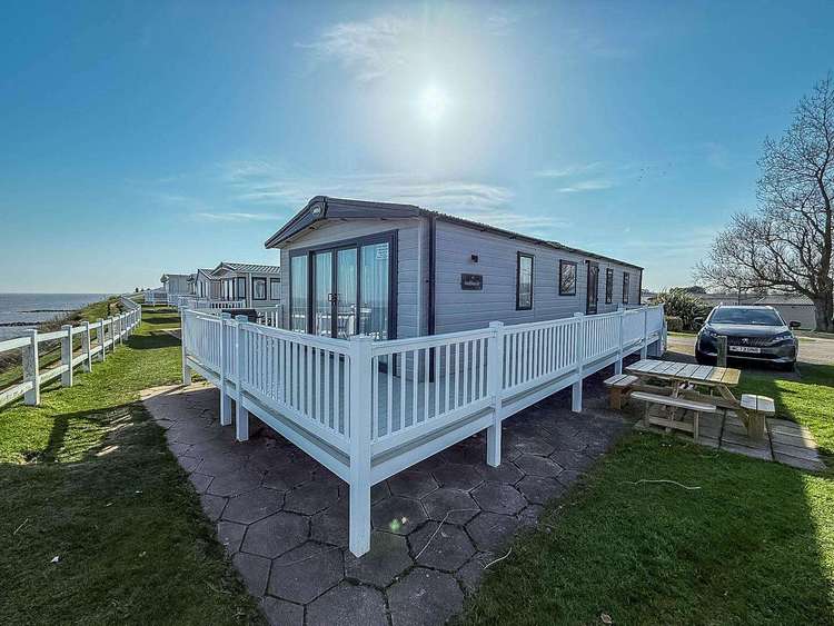 80001H⛱️ – Horizons area, 3 bed, 8 berth caravan with full sea views. Platinum-Deluxe rated. Preview 0