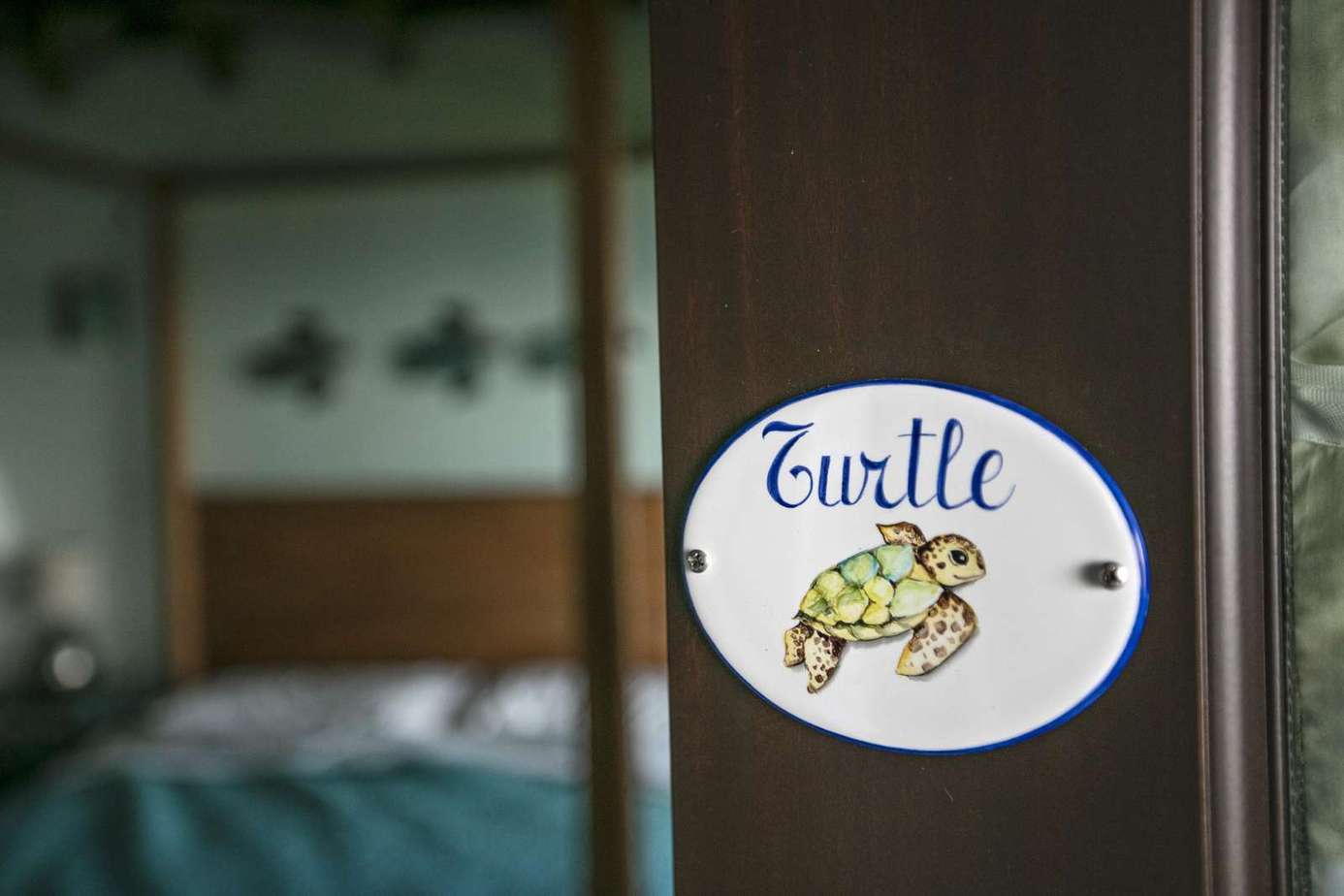 Cozy bedroom retreat with charming turtle decor detail