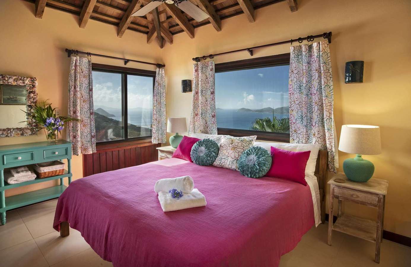 Cozy bedroom with panoramic mountain and lake views
