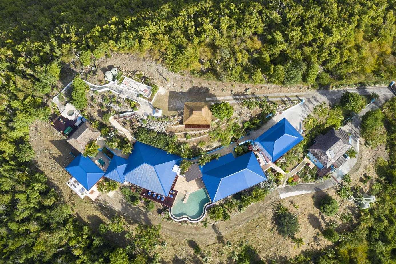 Secluded hillside retreat with private pool and lush views