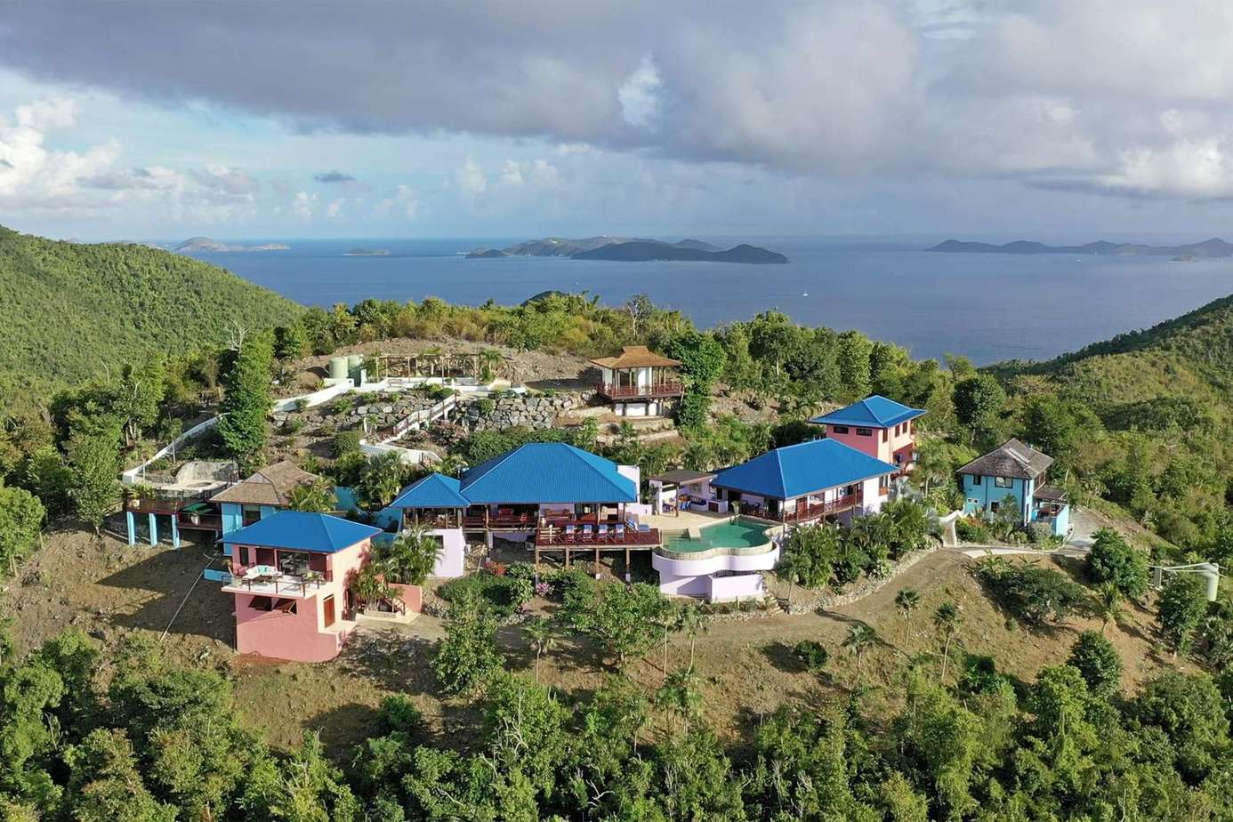 Secluded hillside retreat with panoramic ocean views and pool