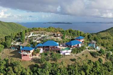 Secluded hillside retreat with panoramic ocean views and pool
