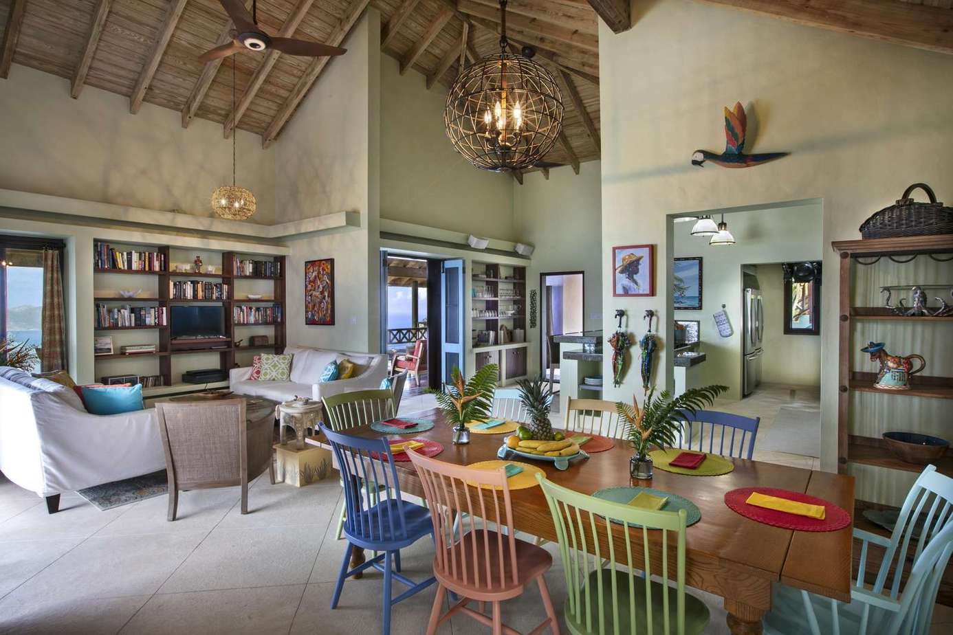 Spacious open living and dining area with vibrant seating