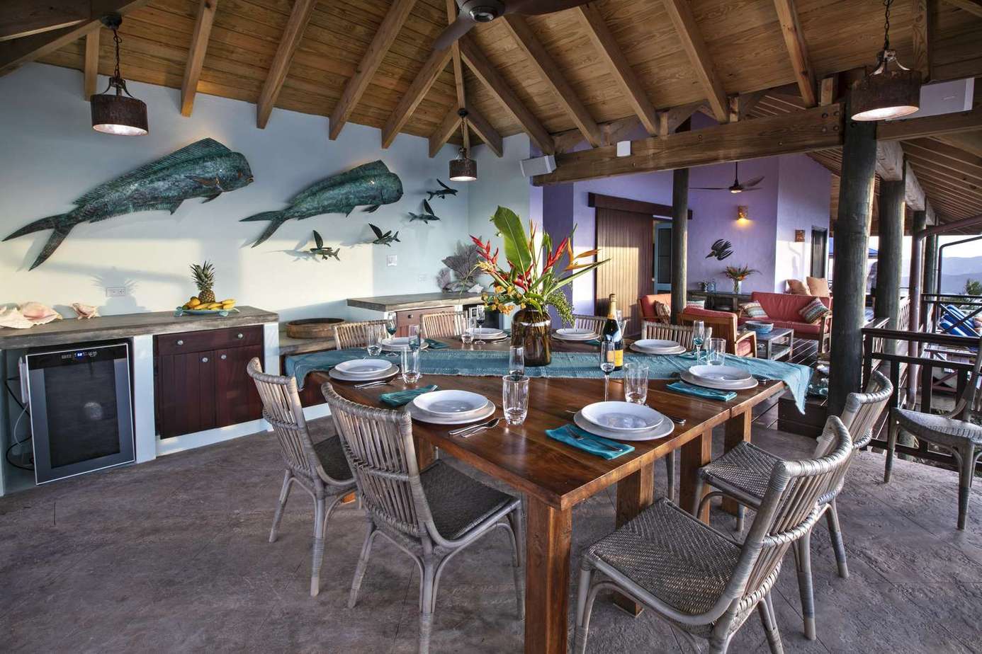 Spacious outdoor dining area with ocean-inspired decor