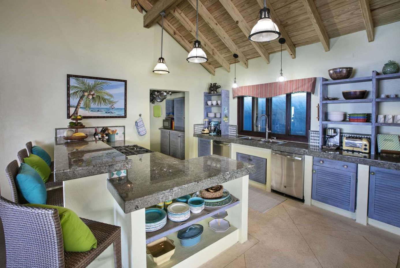 Bright, airy kitchen with vaulted ceilings and cozy seating nook