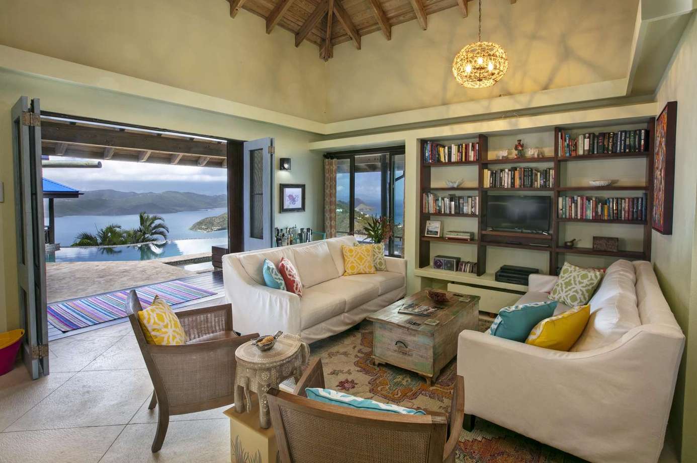 Cozy living room with stunning lake views and open-air charm